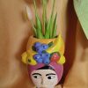 Vaso testa di donna
